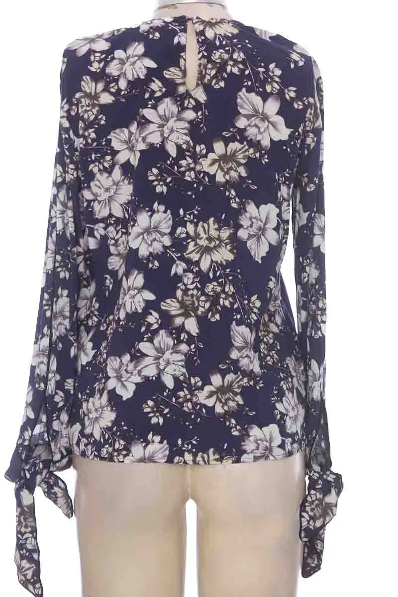 BLUSA COLOR AZUL  CHEVIGNON