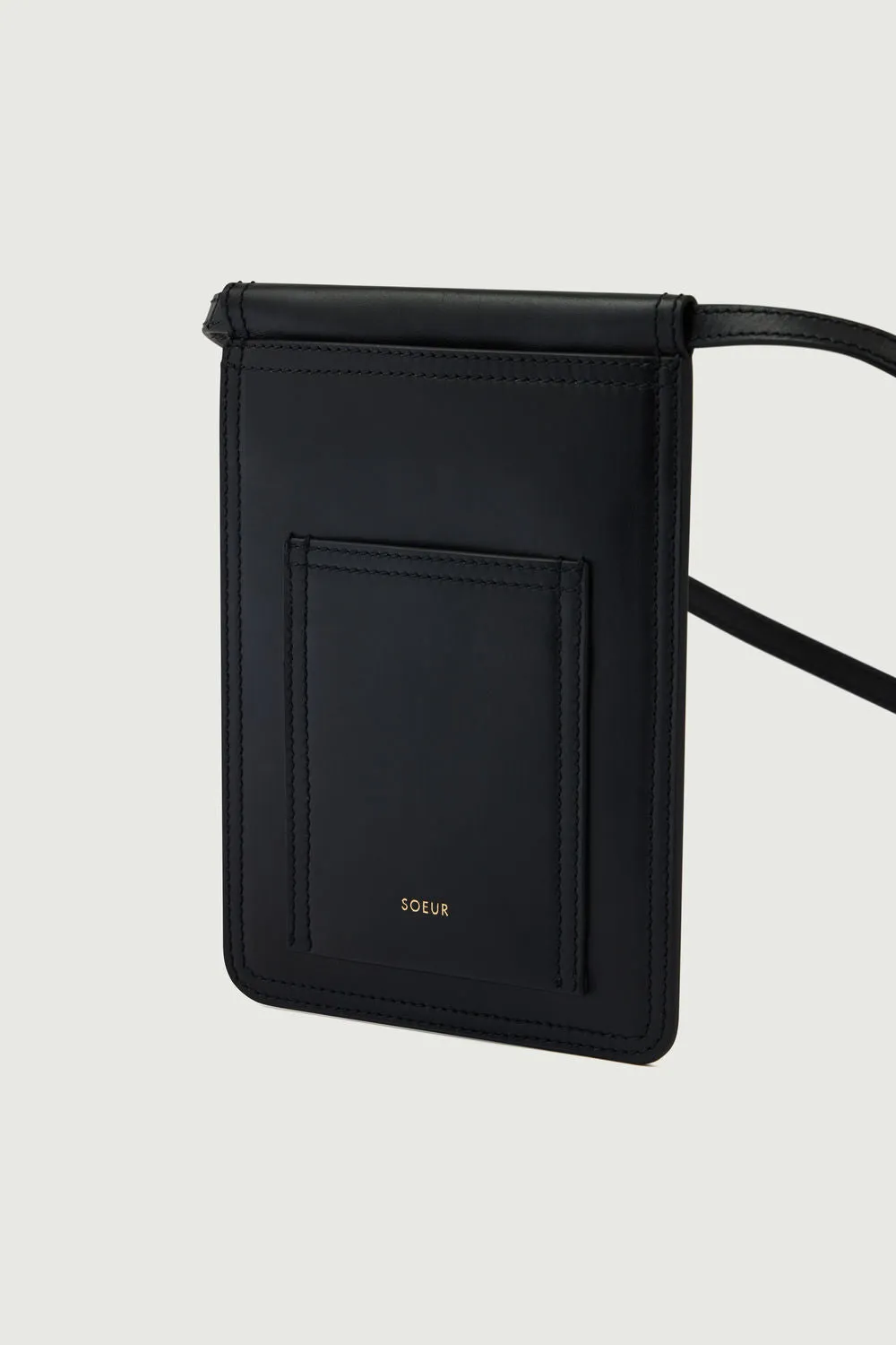 BOLSILLO BALDY Pochetera plana de cuero liso con bandolera