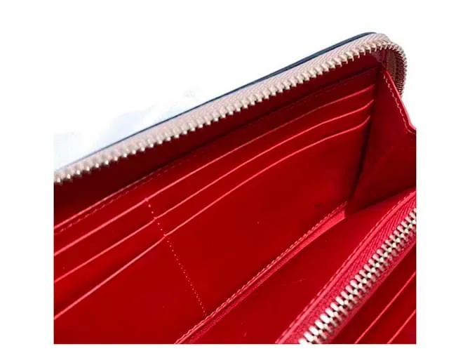 Cartera larga de cuero metálico rosa Christian Louboutin Plata 