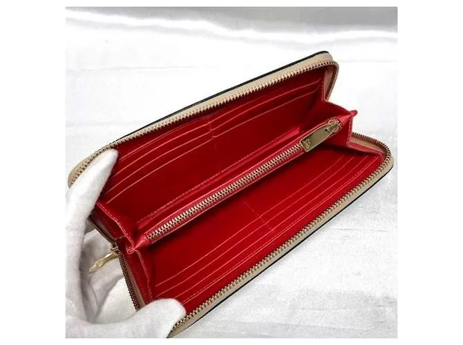 Cartera larga de cuero metálico rosa Christian Louboutin Plata 