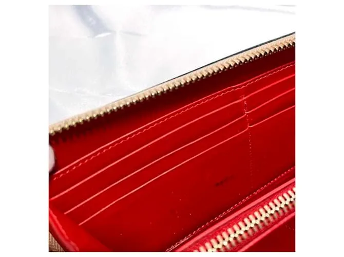 Cartera larga de cuero metálico rosa Christian Louboutin Plata 