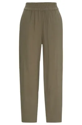 Pantalones regular fit con corte cónico