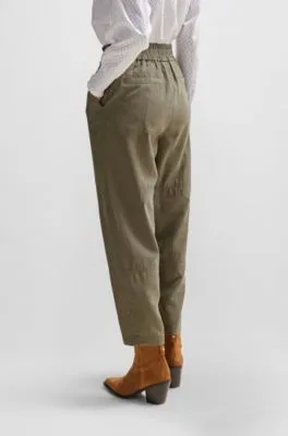 Pantalones regular fit con corte cónico