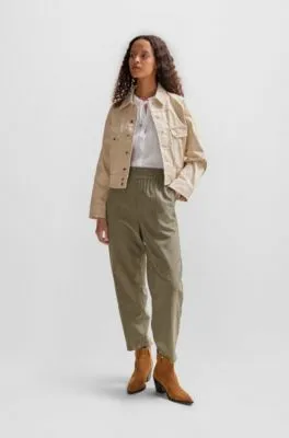 Pantalones regular fit con corte cónico