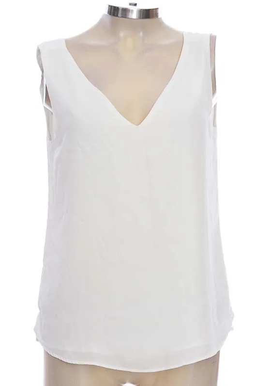 TOP / CAMISETA COLOR BLANCO  NAF NAF